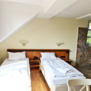 Bild 4-Bett-Apartment (42-52) - Ansicht Betten Gartenseite